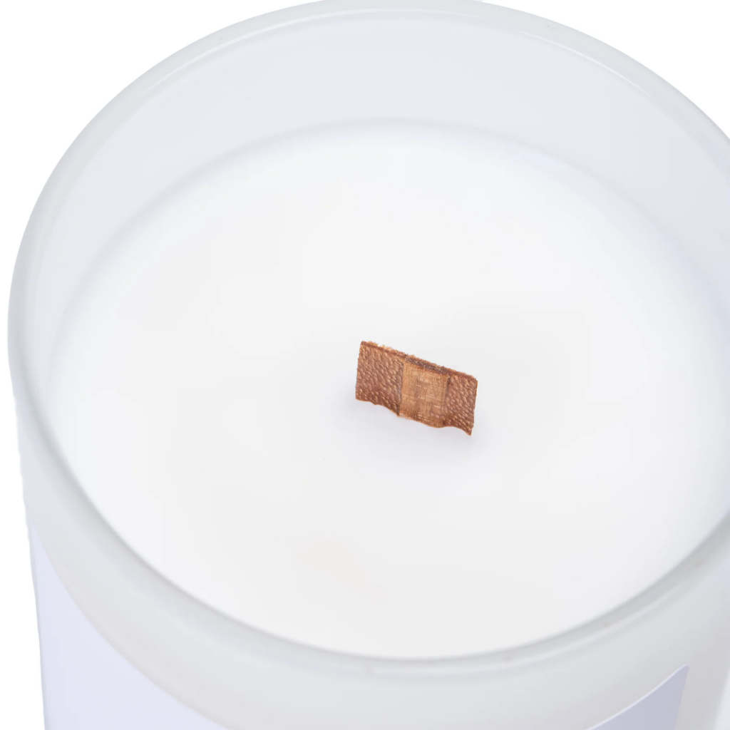 Close-up of the FSC-certified wood wick in the Emotional Support luxury candle.