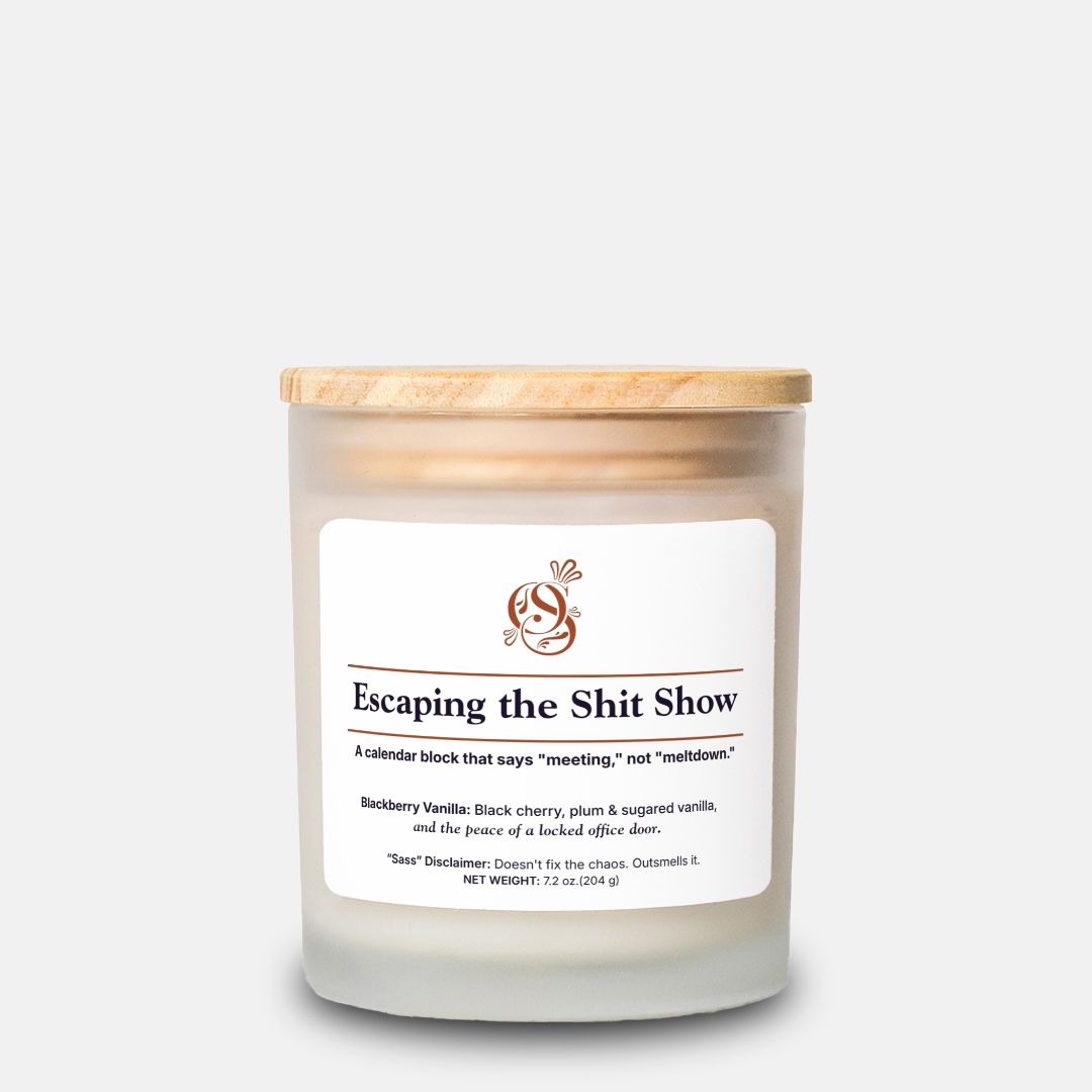 Escaping the Shit Show candle in a frosted glass jar with a wood wick, Blackberry Vanilla scent.
