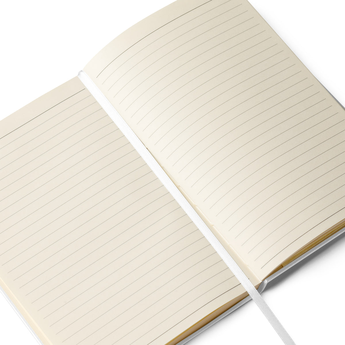 Open notebook showing cream lined pages and ribbon page marker.