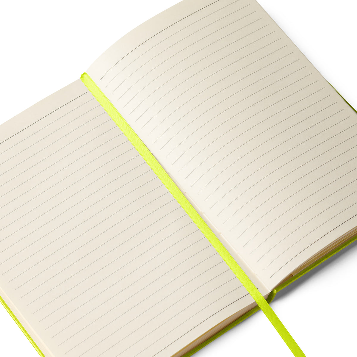 Open notebook showing cream lined pages and ribbon page marker.