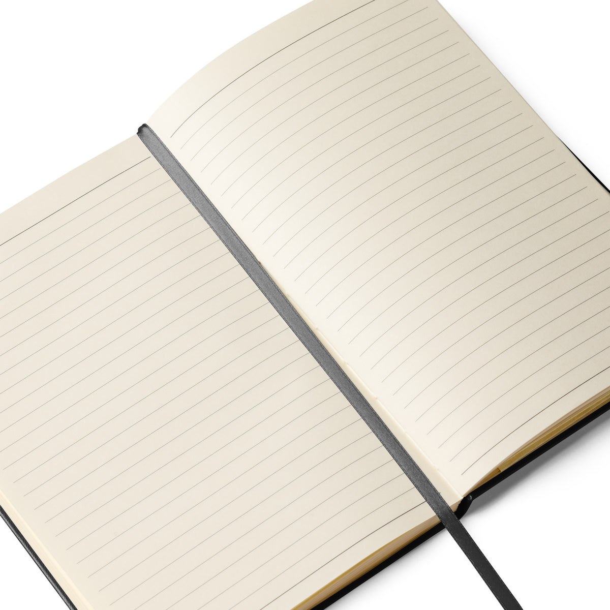 Open notebook showing cream lined pages and ribbon page marker.