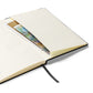 Close-up of the notebook's expandable inner pocket, open to show storage space for loose notes or cards.