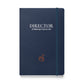 A5 hardcover notebook in midnight navy with "Director of Making It Up as I Go" on the cover.